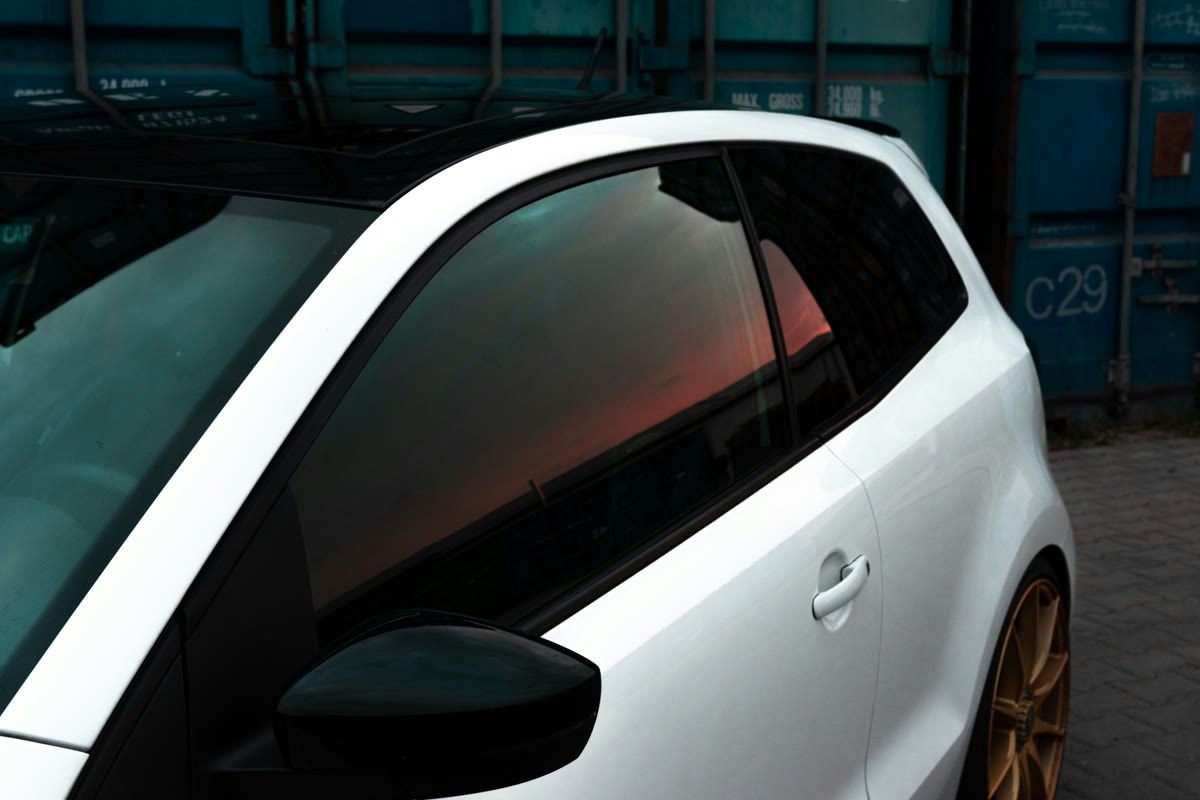 Car window tinting Perth: close-up of professionally tinted side glass