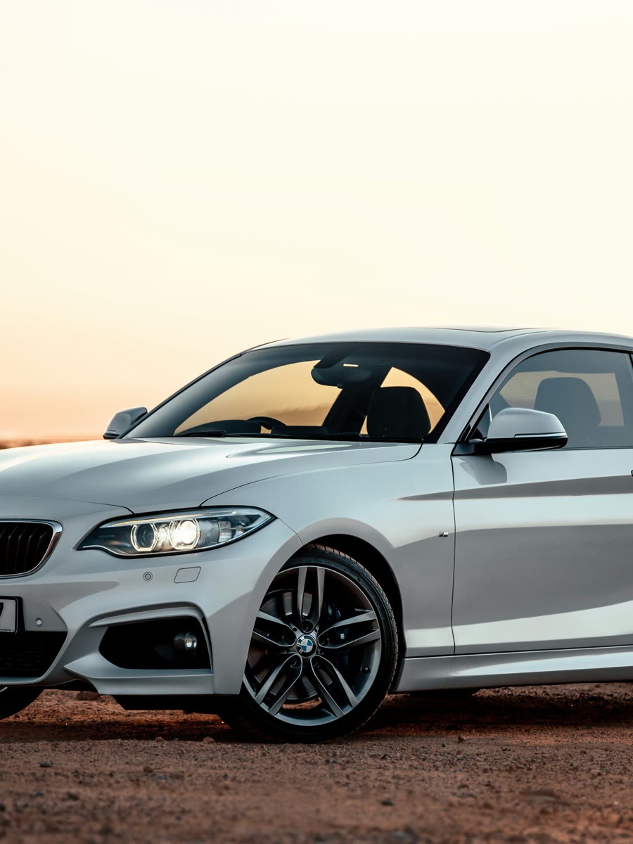 Car tinting prices Perth: everyday coupe with tinted windows at sunset, no call-out fee