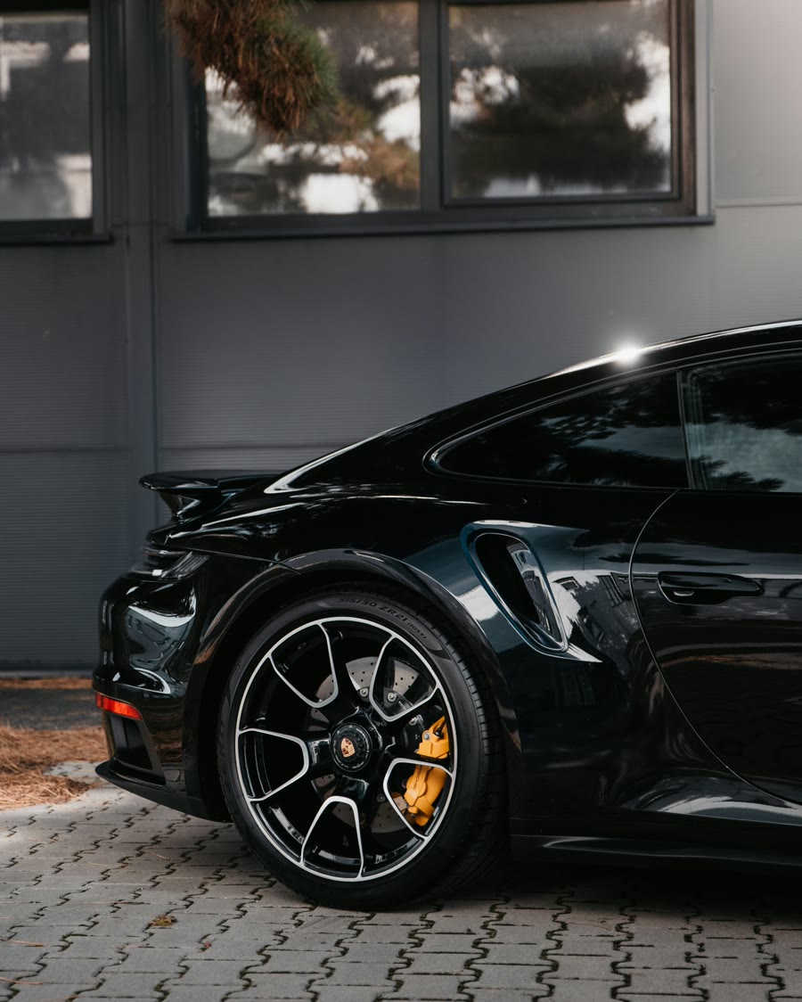 Car tinting prices Perth: rear quarter glass on a parked car, the glass area that vehicle size changes