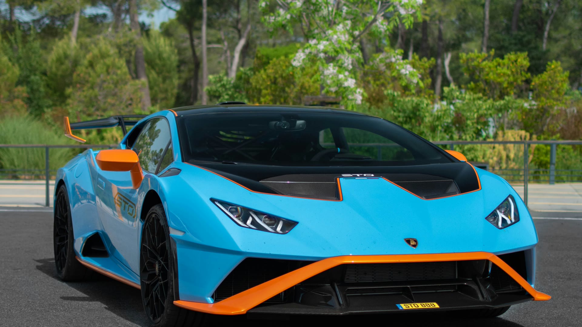 Car window tinting FAQ Perth: freshly tinted side glass on a car outside a home